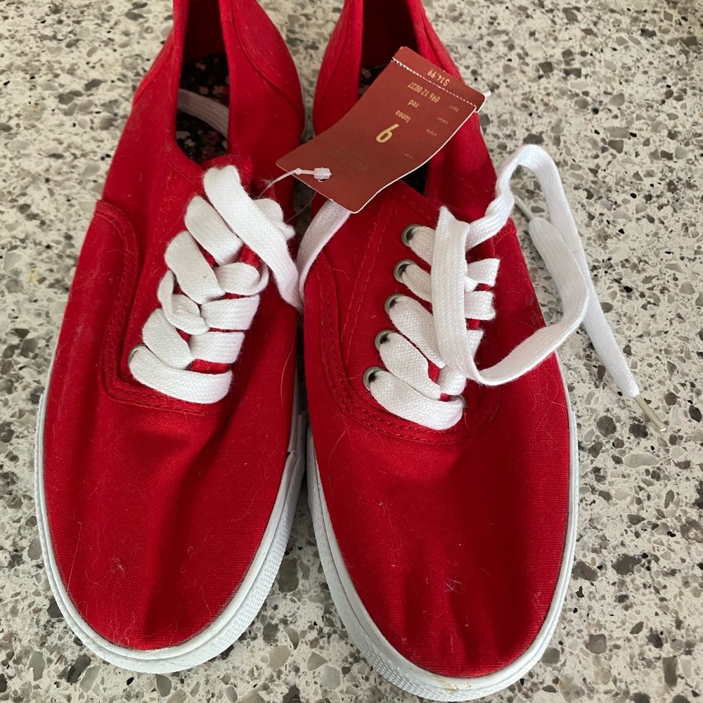 Never worn red sneakers
